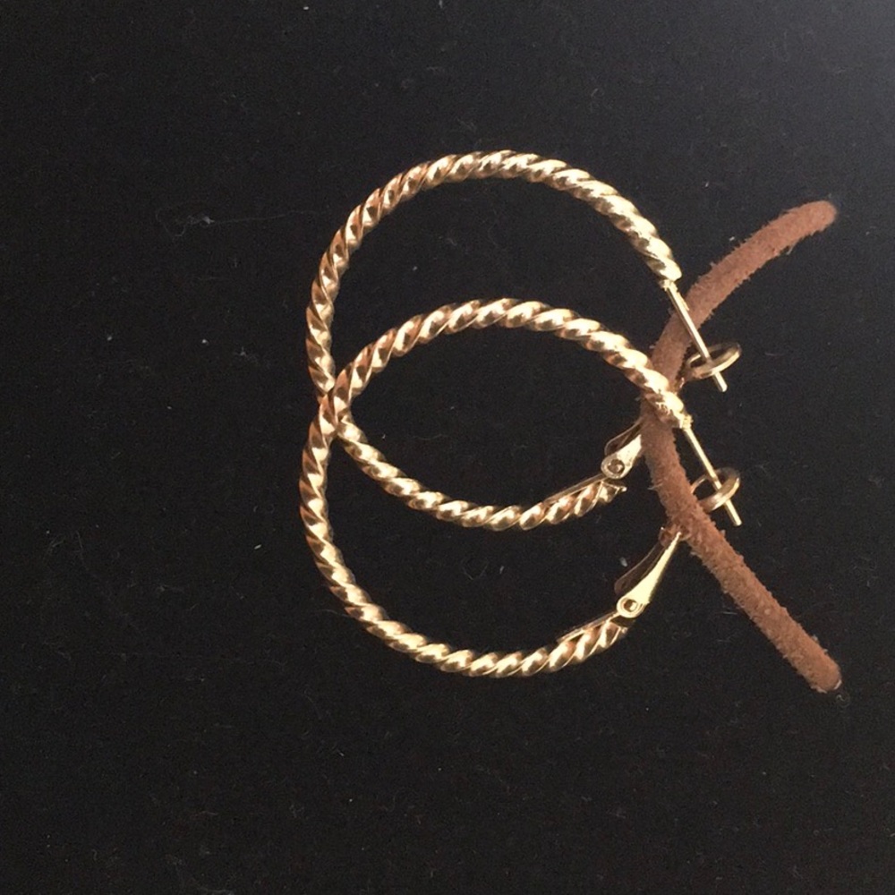 Gold toned twisted loops